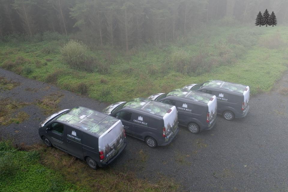 Green Belt vehicles in a forest